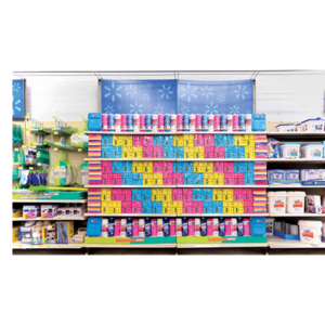A colorful retail display of cleaning products arranged in a symmetrical pattern on shelves. Brightly colored boxes in yellow, pink, and blue form a visually appealing mosaic.